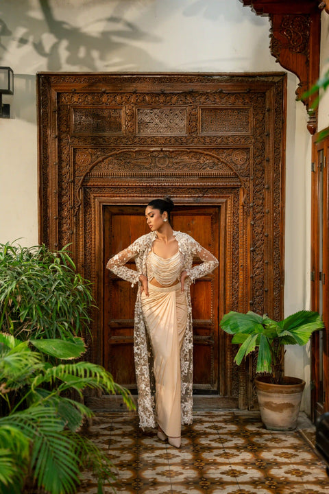 Pearl string bustier and knot skirt set